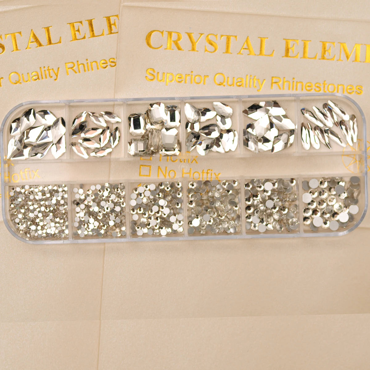 12-Grid Clear Crystal Nail Art Rhinestones Set - 780 Pieces Mixed Sizes 3D Glitter Gems for Professional Nail Decoration