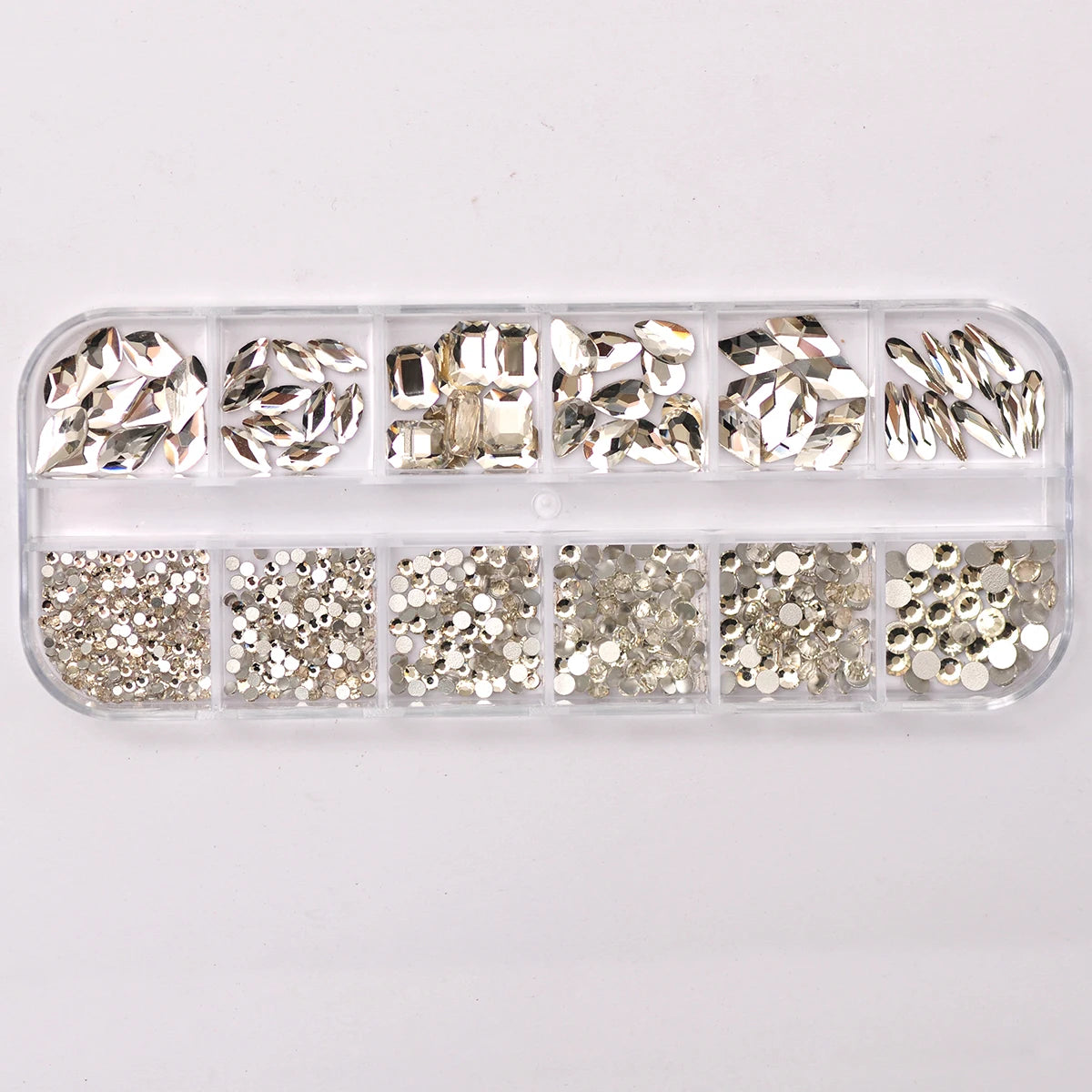 12-Grid Clear Crystal Nail Art Rhinestones Set - 780 Pieces Mixed Sizes 3D Glitter Gems for Professional Nail Decoration